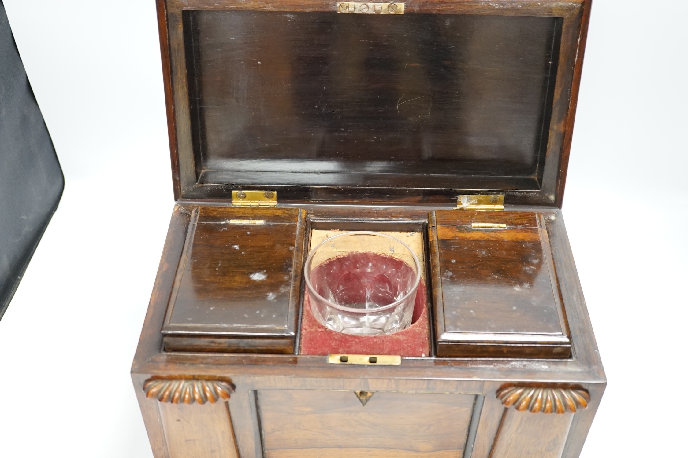 A large William IV rosewood sarcophagus tea caddy, 27cm high. Condition - escutcheon missing, fair